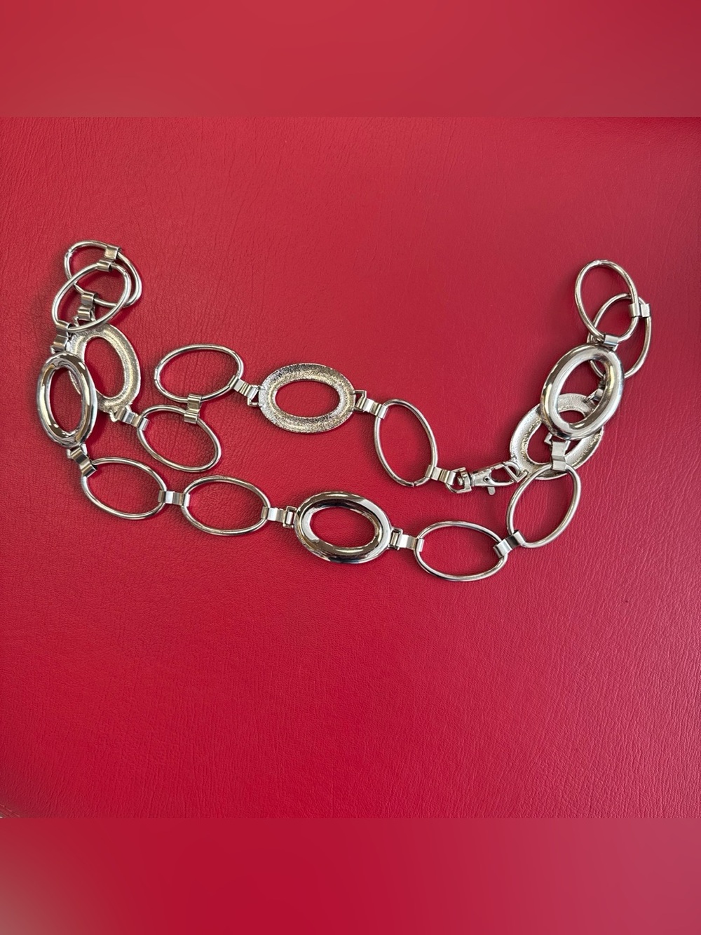 vintage Y2K silver-tone geometric interlocking oval chain belt